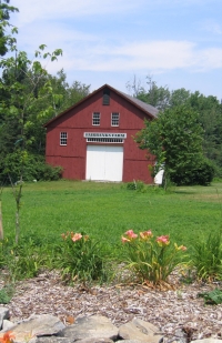 Red Barn with Flowers
